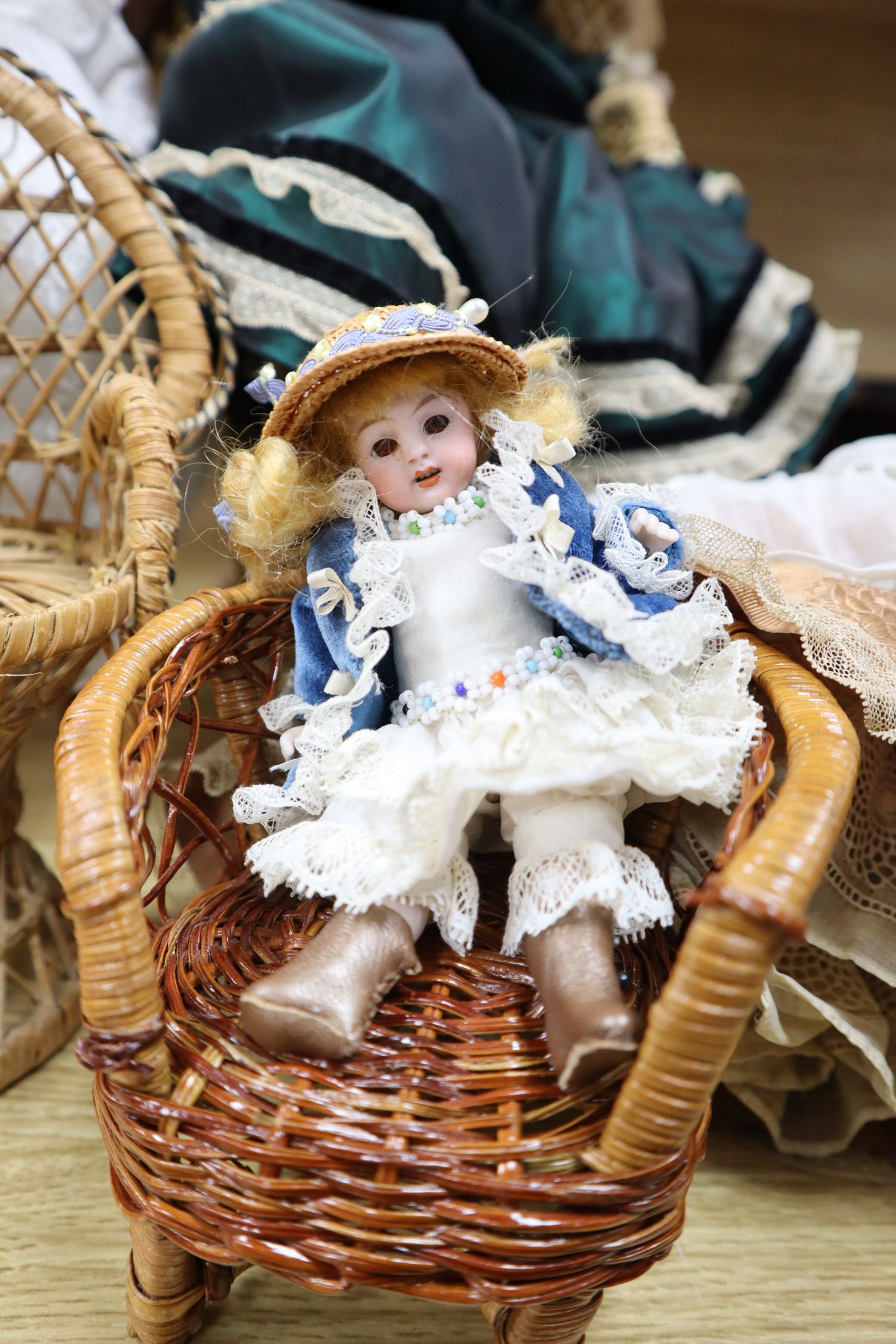 A small collection of bisque head dolls, including a Max Oscar Arnold example